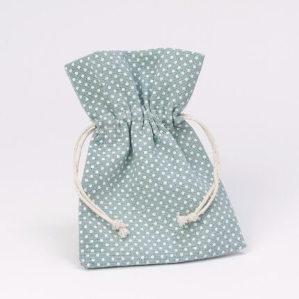 Bolsa de algodón azul topos blancos.